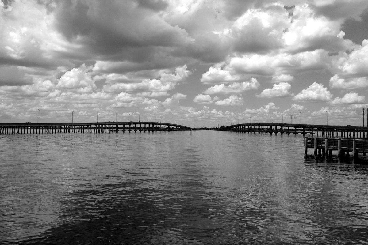 The two US 41 bridges crossing the Peace River at Punta Gorda, seen across open water